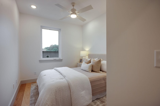 bedroom featuring baseboards, recessed lighting, a ceiling fan, and light wood finished floors