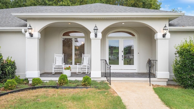 entrance to property featuring french doors