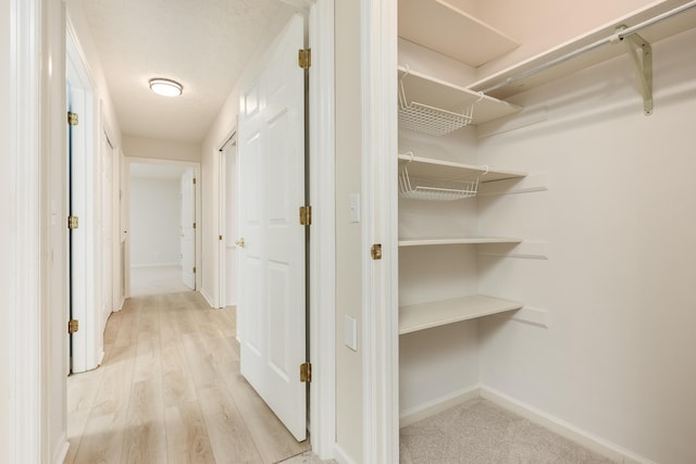 hallway featuring light hardwood / wood-style floors