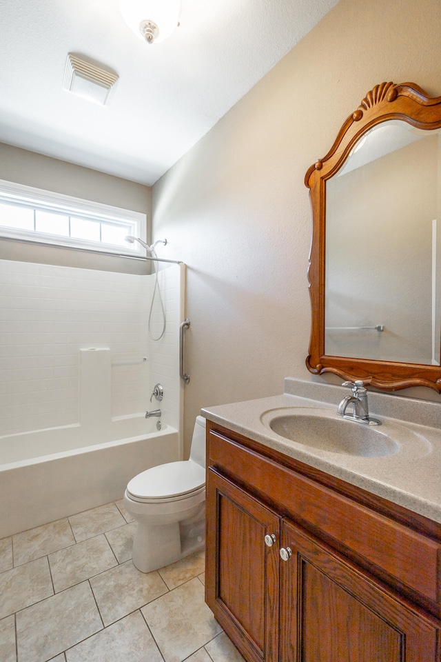 full bathroom featuring tub / shower combination, tile patterned flooring, vanity, and toilet