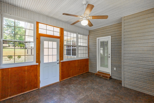 interior space featuring ceiling fan