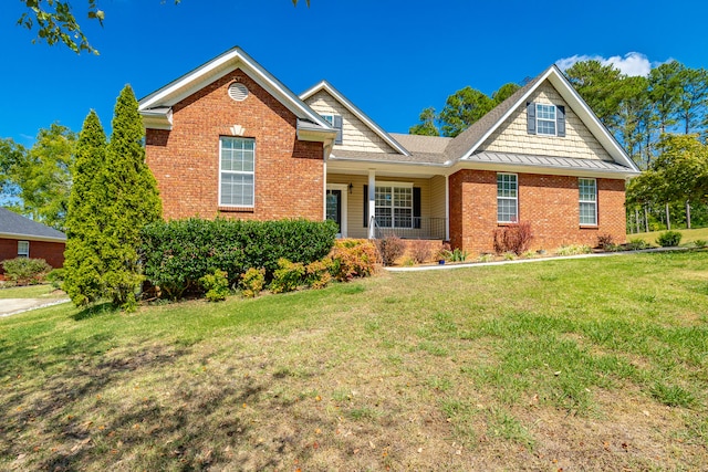 view of front facade with a front yard