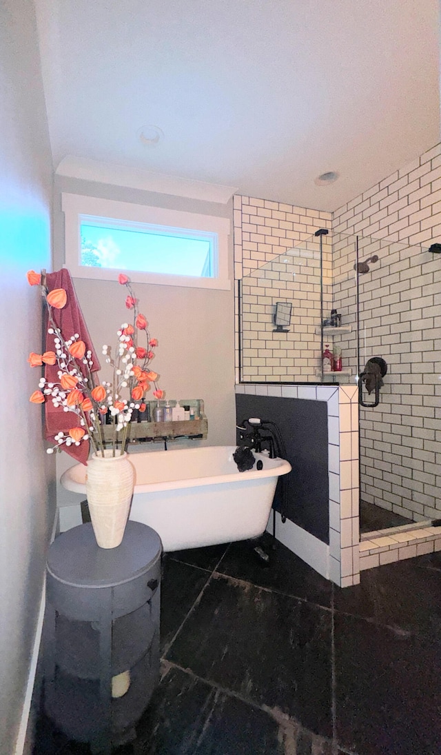 bathroom featuring independent shower and bath and tile patterned floors