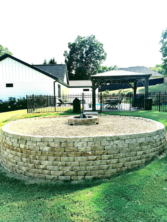 surrounding community featuring a lawn and a gazebo