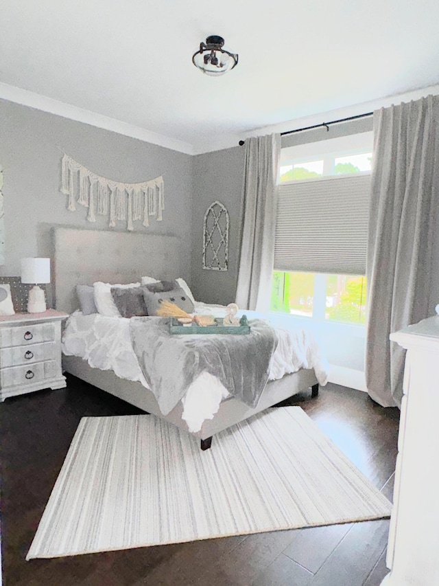 bedroom featuring hardwood / wood-style floors