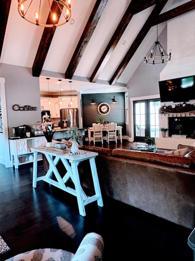 living room with an inviting chandelier, wood-type flooring, beamed ceiling, and high vaulted ceiling