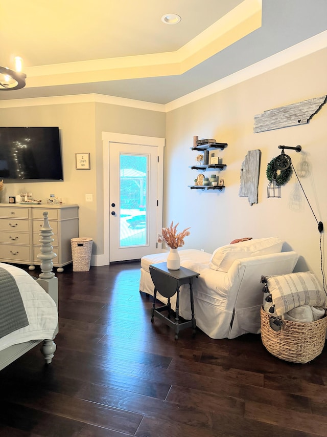 bedroom featuring ornamental molding and dark hardwood / wood-style flooring