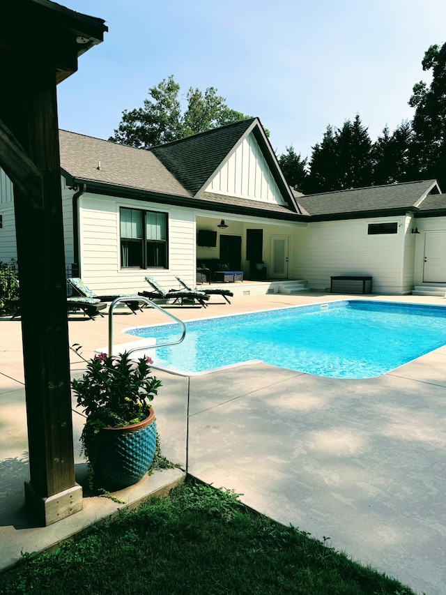 view of pool featuring a patio