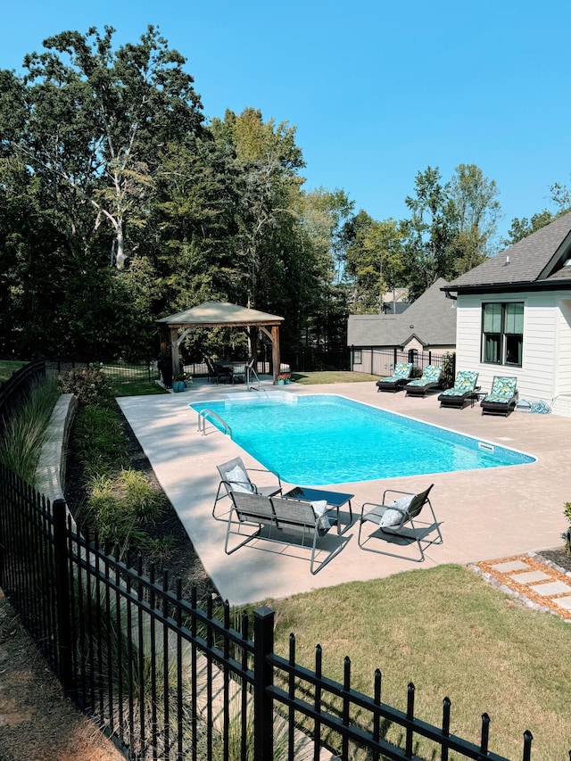 view of pool with a gazebo and a patio area