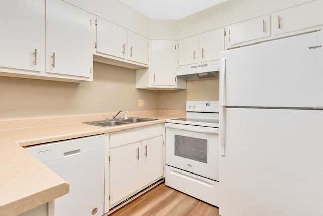 kitchen featuring white cabinets, white appliances, light hardwood / wood-style floors, and sink