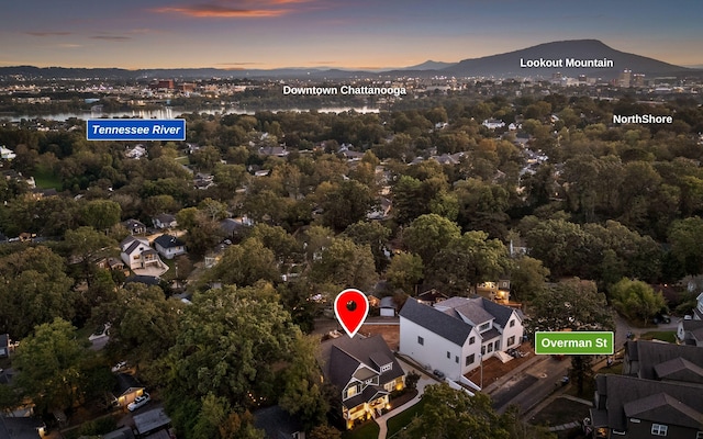 aerial view at dusk with a mountain view