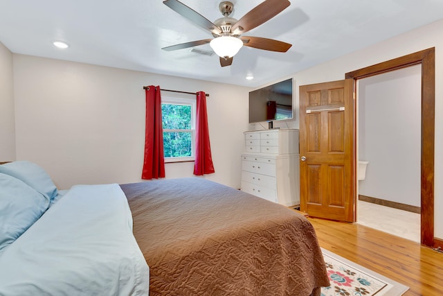 bedroom featuring wood-type flooring and ceiling fan