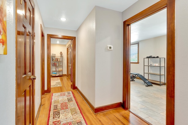 corridor featuring light hardwood / wood-style flooring