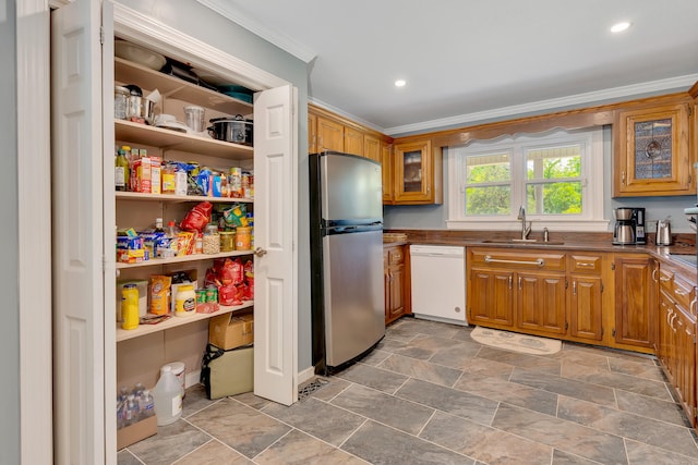 kitchen featuring stainless steel fridge, crown molding, sink, and white dishwasher