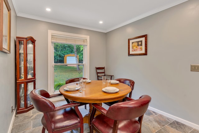 dining room featuring ornamental molding