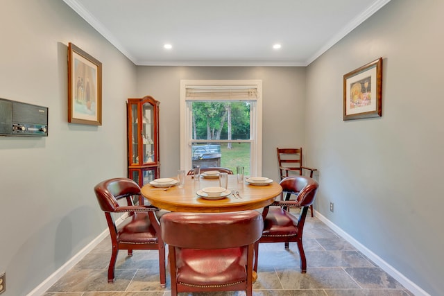 dining room with crown molding