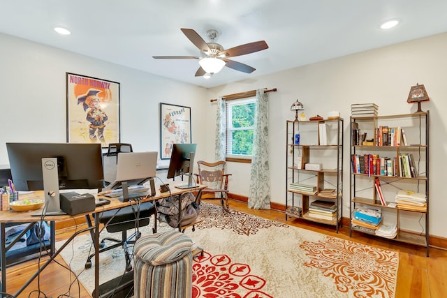 office area featuring light wood-type flooring and ceiling fan