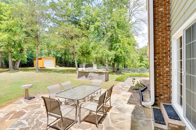 view of patio with a shed