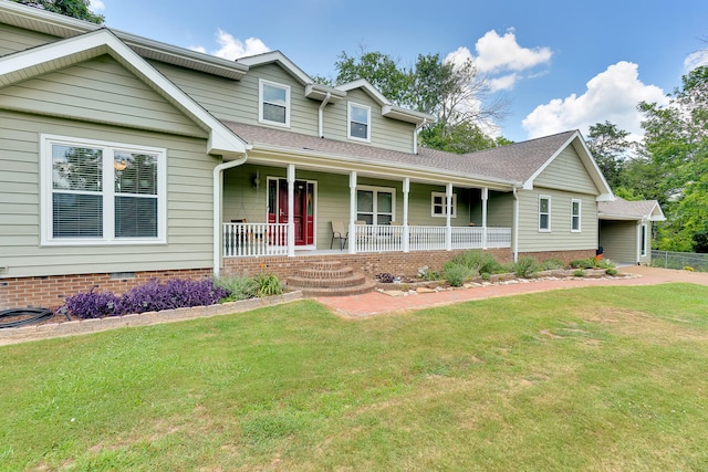 view of front of home featuring a front lawn and covered porch