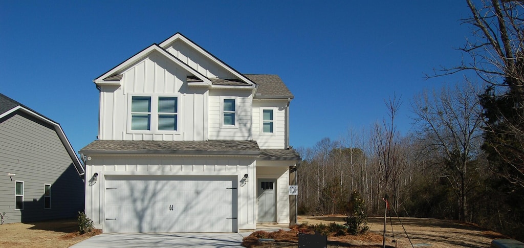 view of front of home with a garage