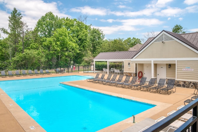 view of pool featuring a patio