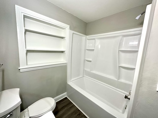 2 Bell Ave, Rossville, GA 30741 - full bathroom with baseboards, wood finished floors, toilet, and shower / washtub combination