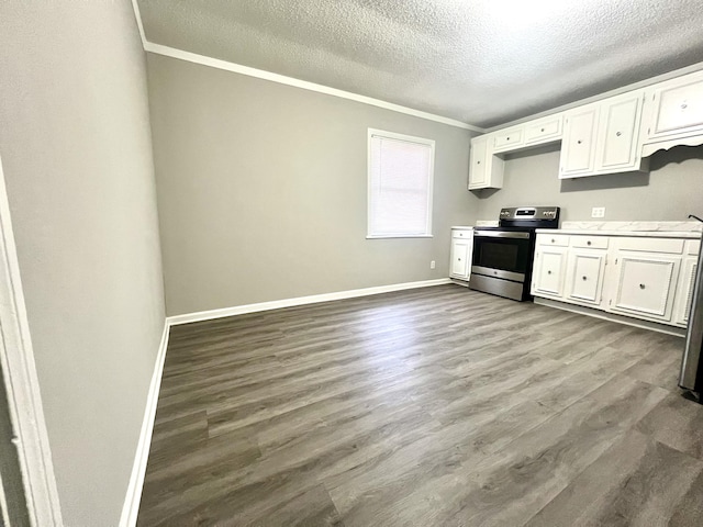 2 Bell Ave, Rossville, GA 30741 - kitchen with white cabinets, stainless steel range with electric cooktop, light countertops, and dark wood finished floors