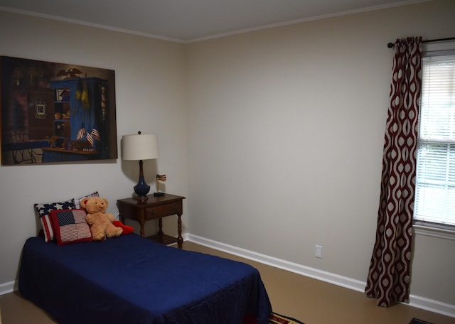 bedroom with crown molding