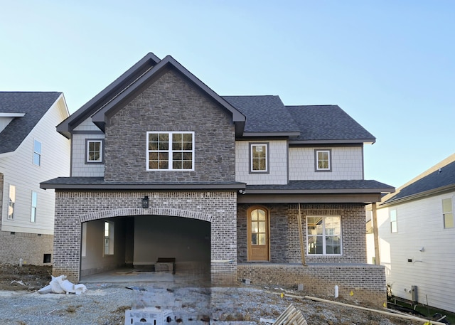 view of front of property with a garage