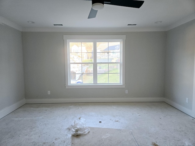 unfurnished room with ceiling fan and ornamental molding