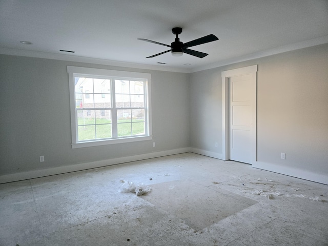 unfurnished room with ceiling fan and ornamental molding