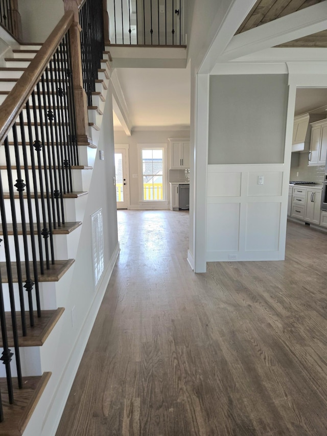 9885 Trestle Cir Unit 47, Ooltewah, TN 37363 - stairway featuring wood finished floors and a decorative wall