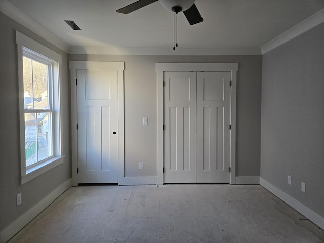 unfurnished bedroom featuring ceiling fan