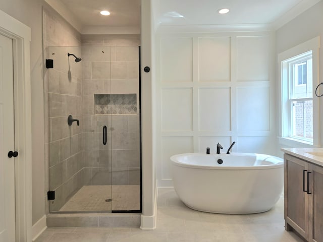 9877 Trestle Cir Unit 46, Ooltewah, TN 37363 - bathroom featuring a shower stall, a freestanding bath, vanity, recessed lighting, and tile patterned flooring