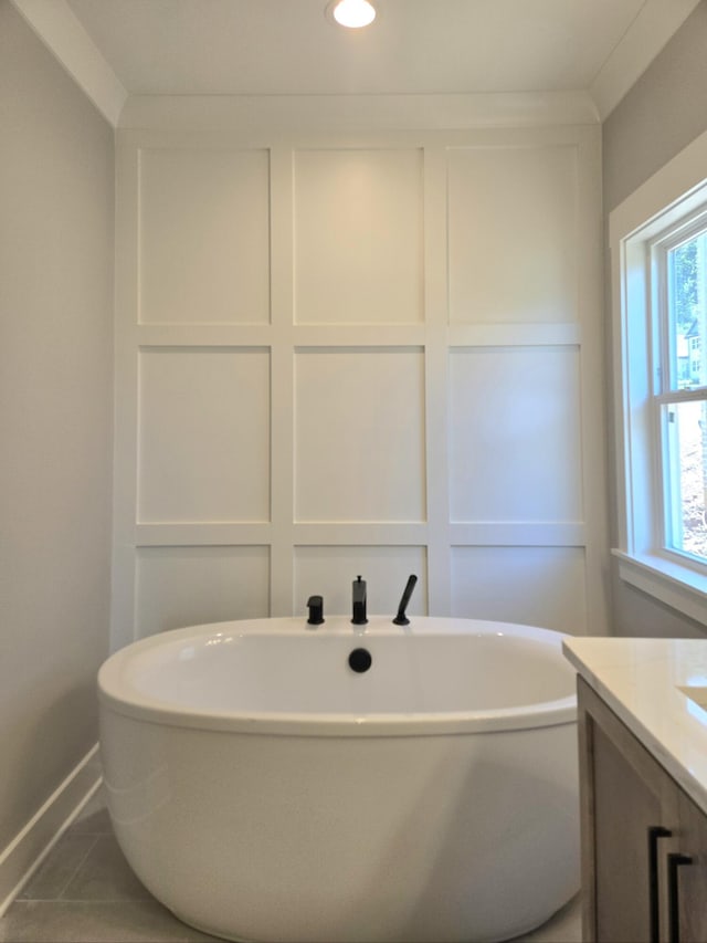 9877 Trestle Cir Unit 46, Ooltewah, TN 37363 - bathroom with a freestanding tub, vanity, baseboards, recessed lighting, and tile patterned floors