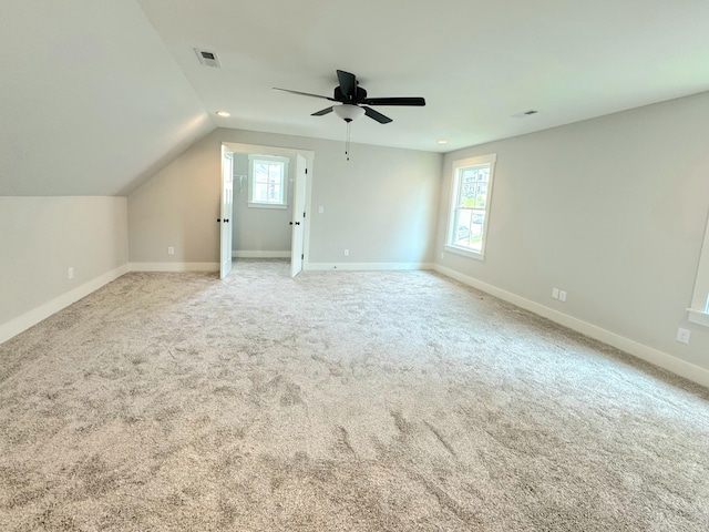 9877 Trestle Cir Unit 46, Ooltewah, TN 37363 - additional living space featuring ceiling fan, baseboards, carpet flooring, and vaulted ceiling