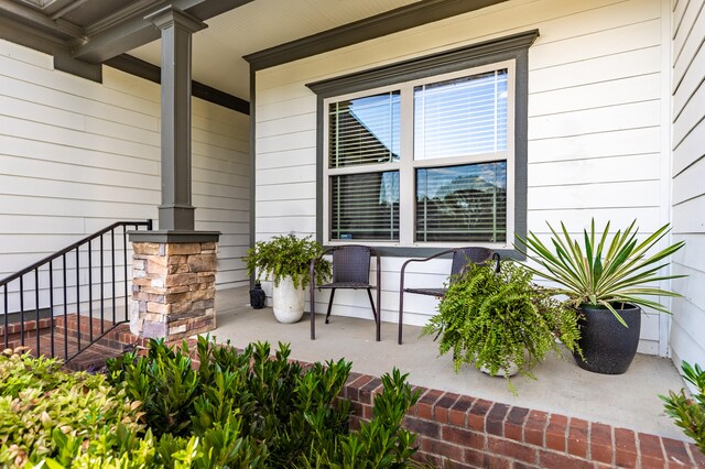 entrance to property with covered porch