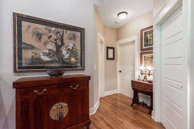 hall with light wood-type flooring