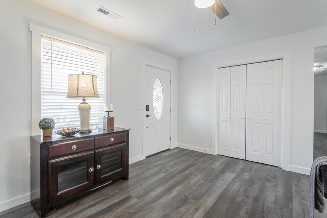 entryway featuring dark hardwood / wood-style flooring and ceiling fan