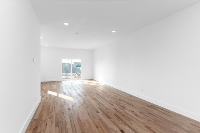 empty room with light wood-type flooring