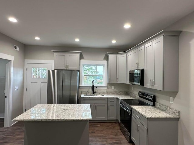 1344 Unity Dr NE Lot 19C, Cleveland, TN 37312 - kitchen with stainless steel appliances, a sink, gray cabinetry, healthy amount of natural light, and recessed lighting
