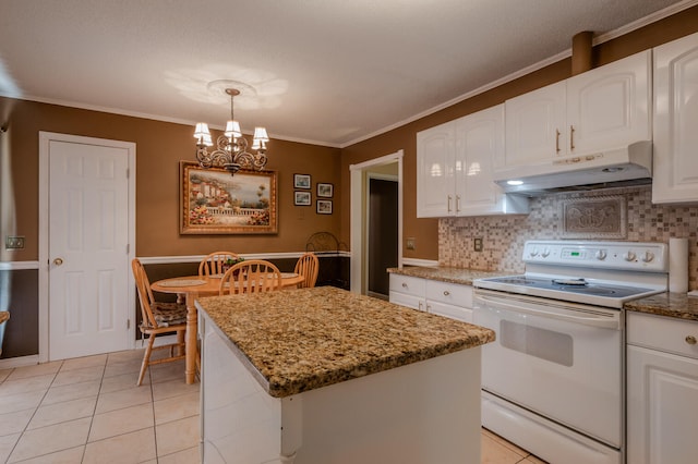 kitchen with white electric range oven, decorative light fixtures, white cabinetry, and a center island