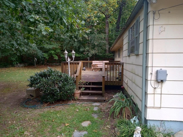 view of yard featuring a deck