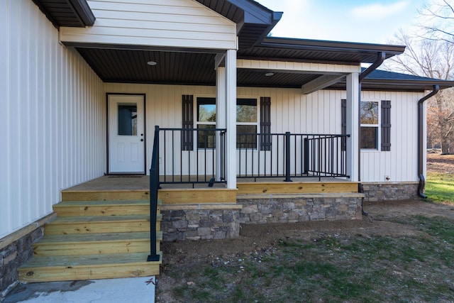 entrance to property with a porch