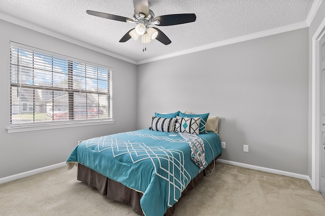 carpeted bedroom featuring ceiling fan, a textured ceiling, and ornamental molding