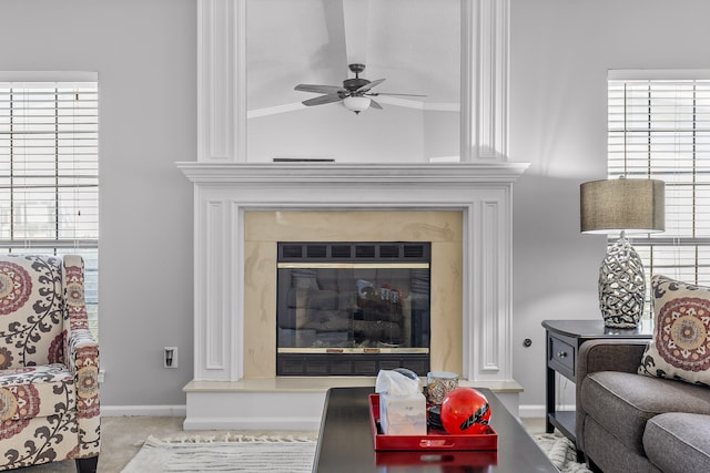 living room with light colored carpet, a fireplace, vaulted ceiling, and a wealth of natural light