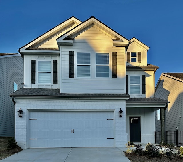 view of front of property featuring a garage