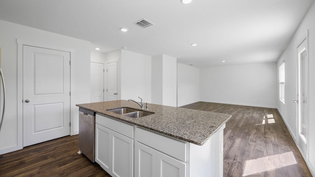 kitchen with visible vents, a sink, white cabinetry, stone counters, and dishwasher