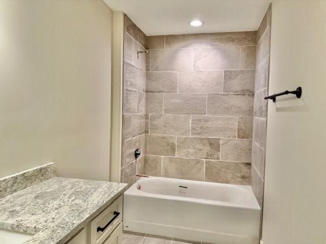 full bathroom featuring tub / shower combination and vanity