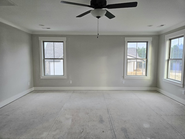 unfurnished room with ornamental molding, visible vents, ceiling fan, and baseboards